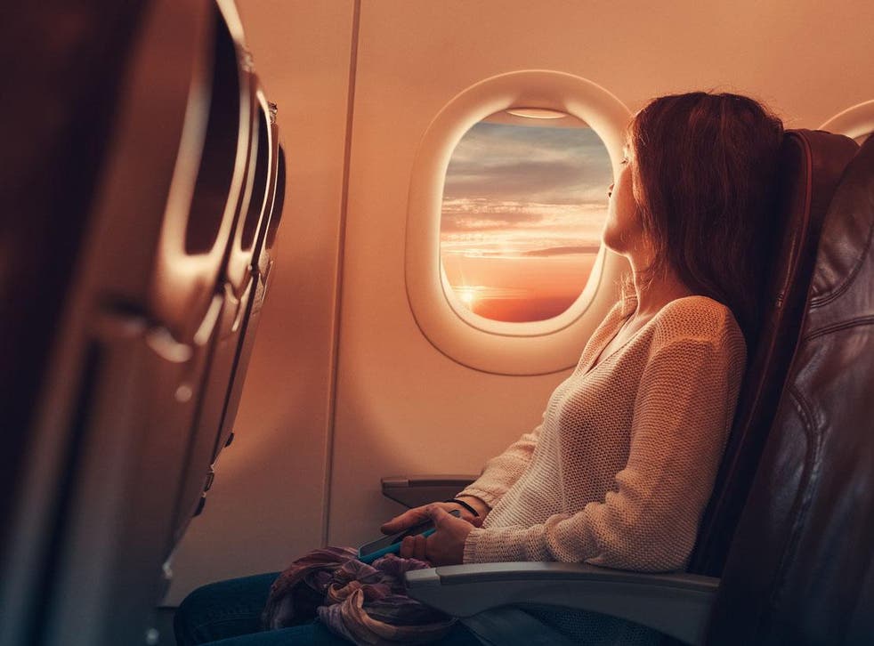 The reality of flying is not as idyllic as this stock photo suggests