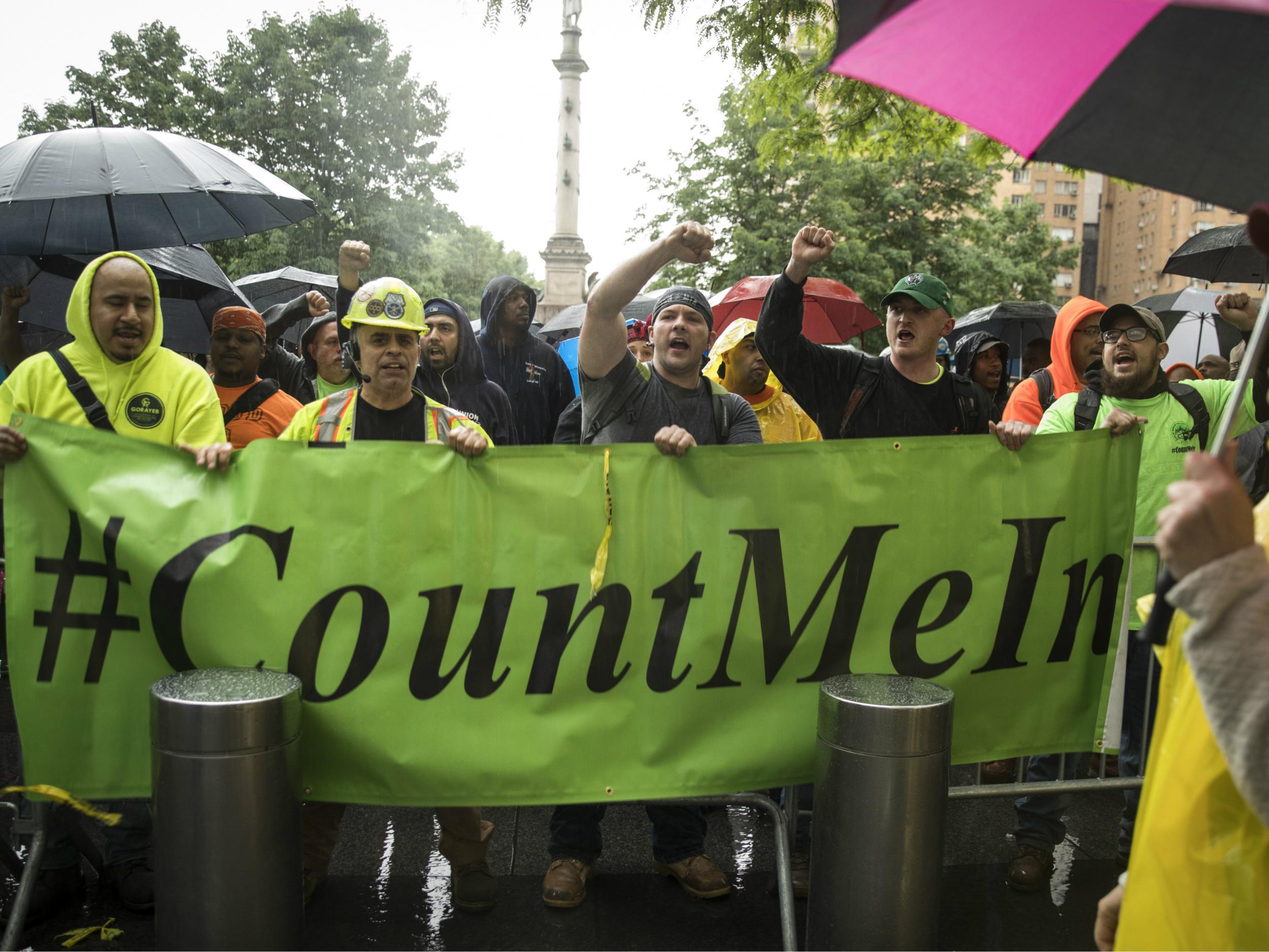 Construction workers and union members hold a rally in New York City ahead of the Supreme Court ruling in the Janus v. AFSCME case, which gave government workers nationwide the choice of opting out of paying union fees even if they benefit from the union's contract negotiations.
