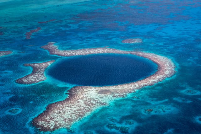 The Belize Barrier Reef system extends roughly 200 miles along the eastern coast of the Yucatan Peninsula