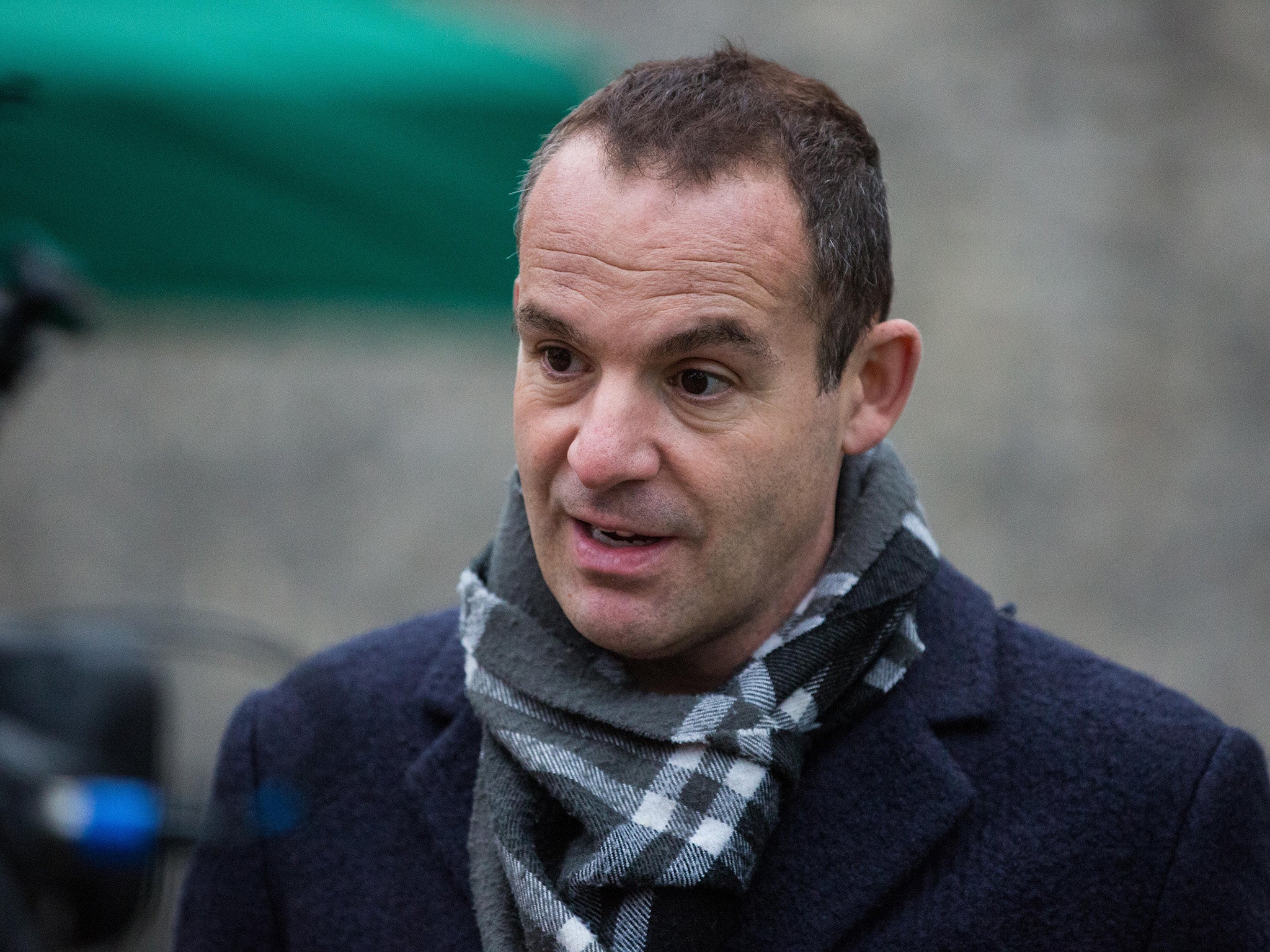 Martin Lewis is suing Facebook for defamation after it published dozens of fake adverts featuring his face and name