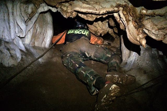 A rescue worker at Tham Luang cave, where 12 Thai boys and their football coach are trapped