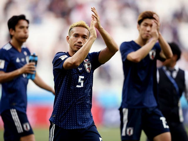 Yuto Nagatomo acknowledges the Japanese fans after the final whistle