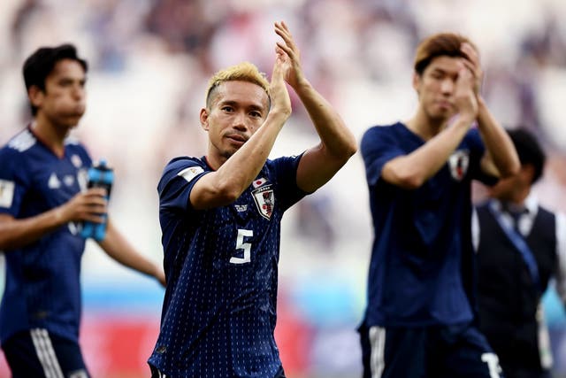 Yuto Nagatomo acknowledges the Japanese fans after the final whistle