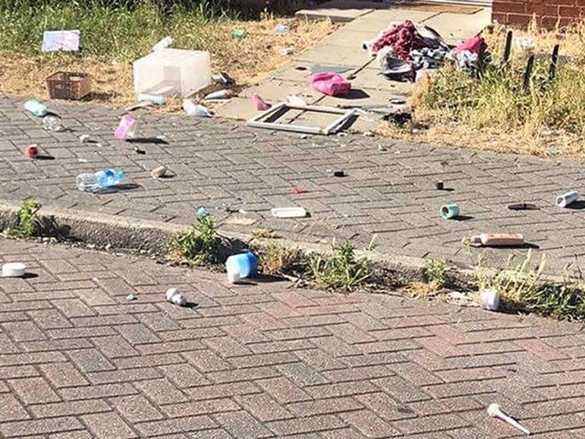 The scene where a rapid response car and an ambulance were pelted with bricks, glass and furniture as they attended what turned out to be a hoax call