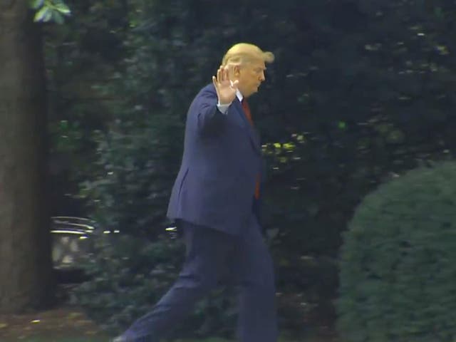 Donald Trump waves away requests to speak to the media outside the White House about the murder of five journalists at Annapolis newspaper the Capital Gazette