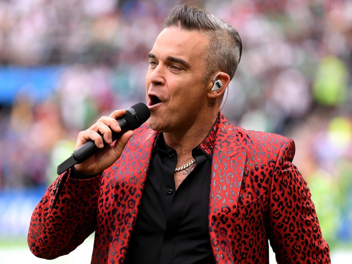 Robbie Williams Reignites Liam Gallagher Feud I D Still Love To Fight Him The Independent The Independent