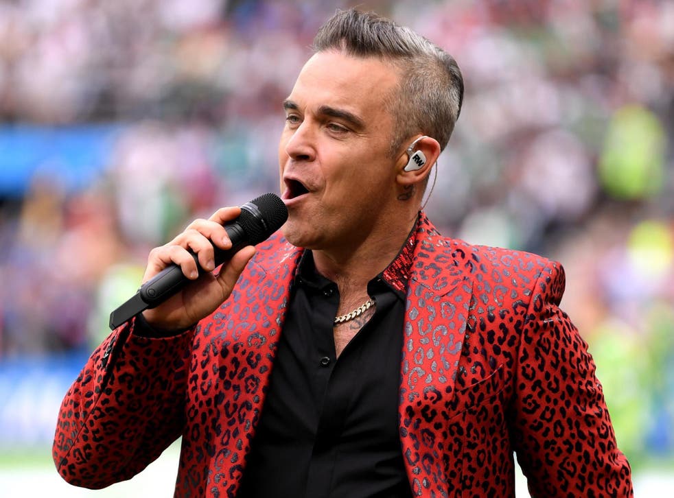 Robbie Williams performs during the World Cup opening ceremony