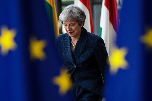 Theresa May arrives at the Council of the European Union on the first day of the European Council leaders' summit on June 28, 2018 in Brussels