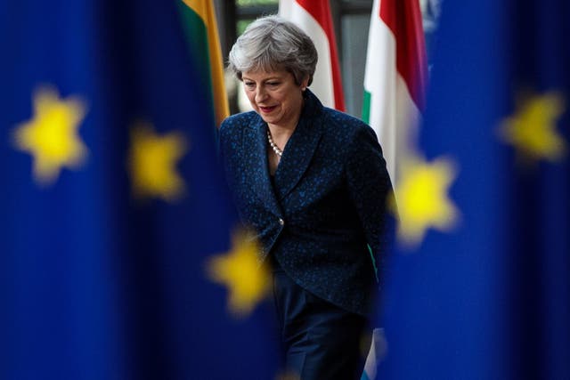 Theresa May arrives at the Council of the European Union on the first day of the European Council leaders' summit