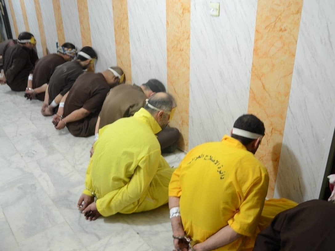 People convicted of terrorism are seen before their execution in Baghdad on Friday