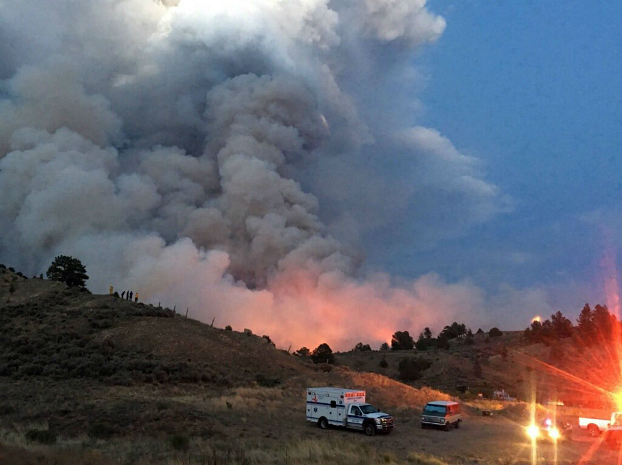 This photo provided by the Department of Homeland Security Emergency Management shows a wildfire burning near Forbes Park in southern Colorado, Thursday, June 28, 2018.