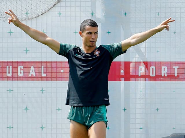 Portugal's Cristiano Ronaldo gestures during a training session