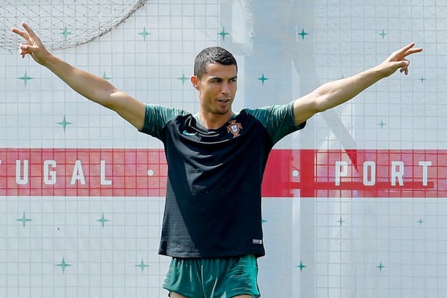 Portugal's Cristiano Ronaldo gestures during a training session