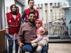 Syrian girl with legs made of tin cans promised she will walk again