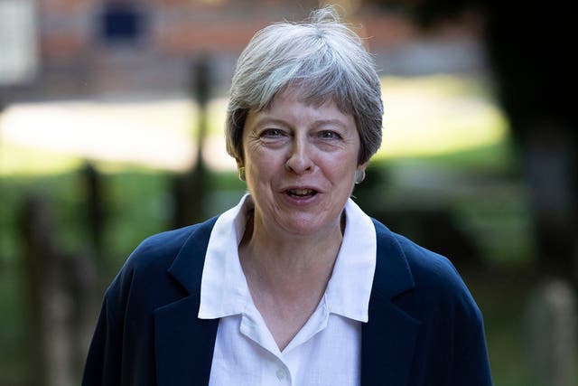 Prime Minister Theresa May leaving after a church service near to her Maidenhead