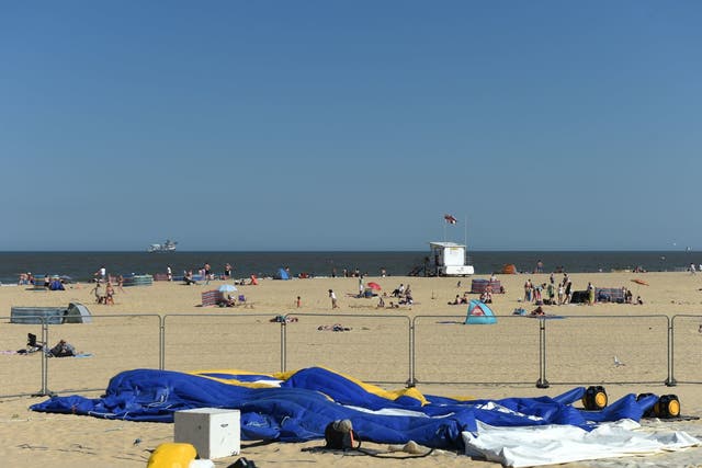 The scene on Gorleston beach in Norfolk, after a young girl died after reportedly being thrown from a bouncy castle