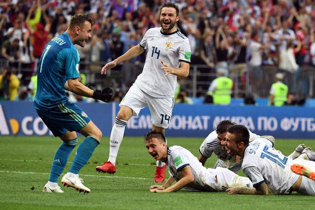 Russia celebrate their match-winning moment