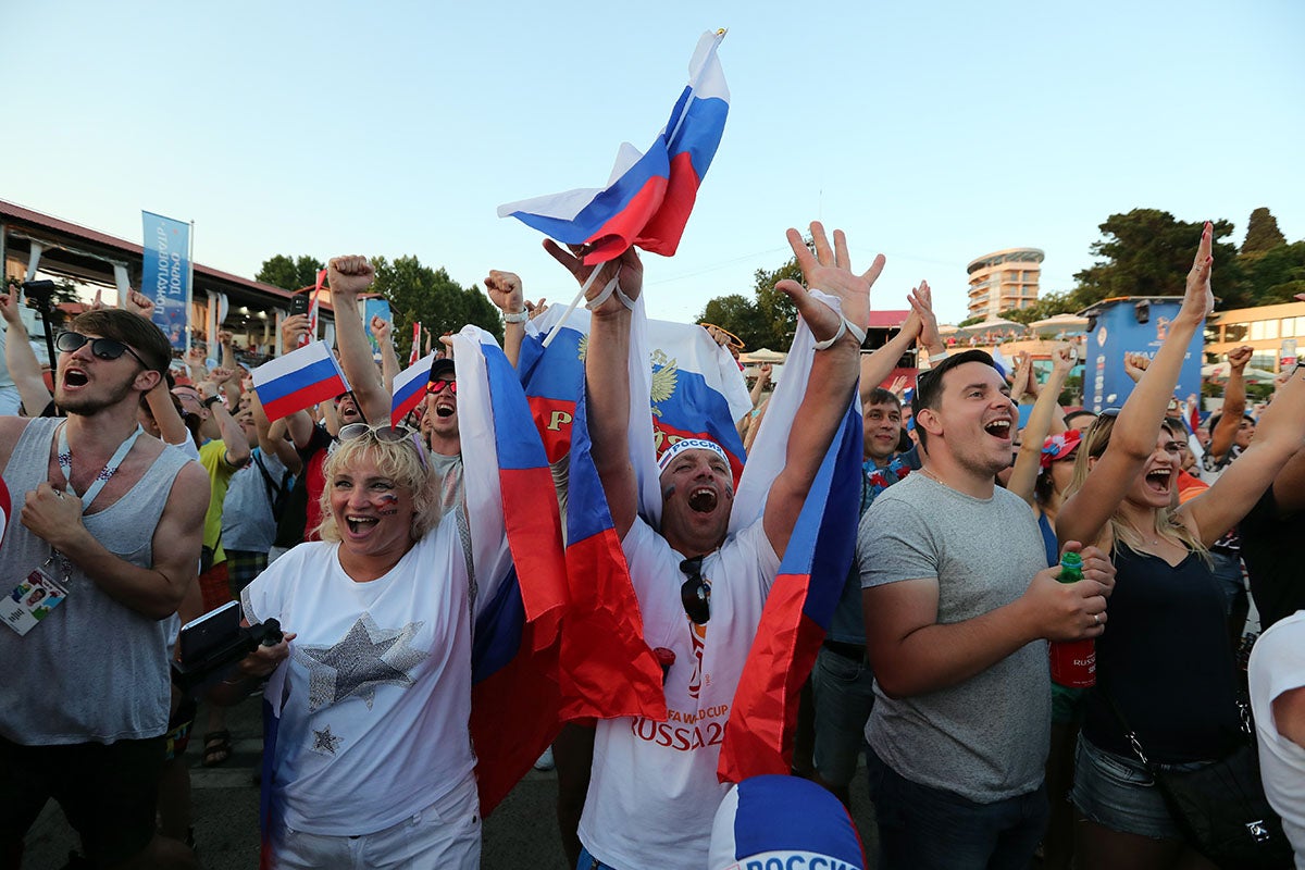 Supporters of Russia celebrate watching their team winning during a public viewing of the FIFA World Cup 2018 round of 16 soccer match between Spain and Russia at the FIFA Fan Zone in Sochi, Russia, 01 July 2018. Russian beat Spain in penalty shootout.