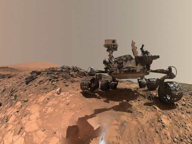 'Curiosity' at the site from which it reached down to drill into a rock target called "Buckskin" on lower Mount Sharp