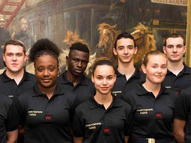 Mamoudou Gassama, pictured with other recruits, was offered a job at the Paris Fire Brigade after rescuing a child