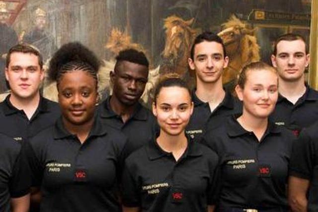 Mamoudou Gassama, pictured with other recruits, was offered a job at the Paris Fire Brigade after rescuing a child