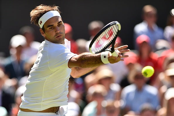 Roger Federer in action wearing his new Uniqlo gear