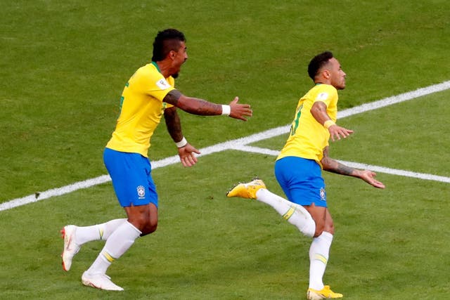 Brazil's Neymar celebrates with Paulinho after scoring their first goal