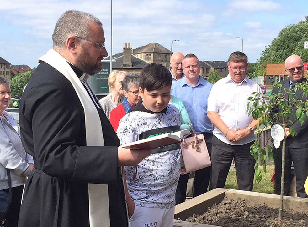 Giorgi Kakava at a ceremony to plant a tree in memory of his mother in Glasgow on 2 July
