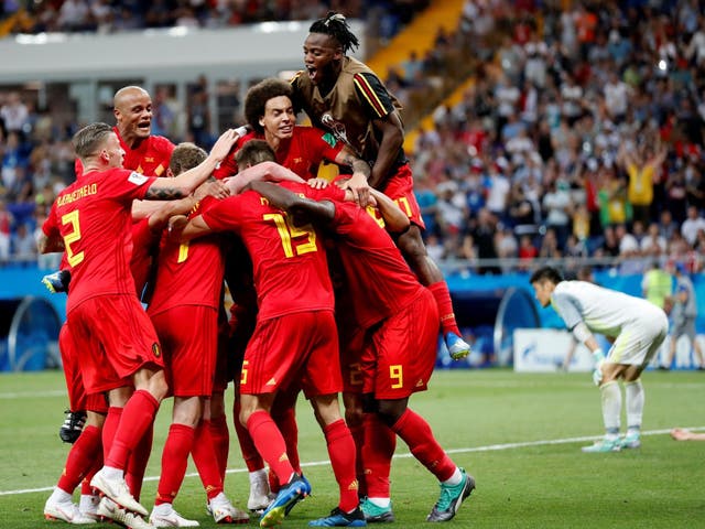 Belgium's Nacer Chadli celebrates scoring their third goal
