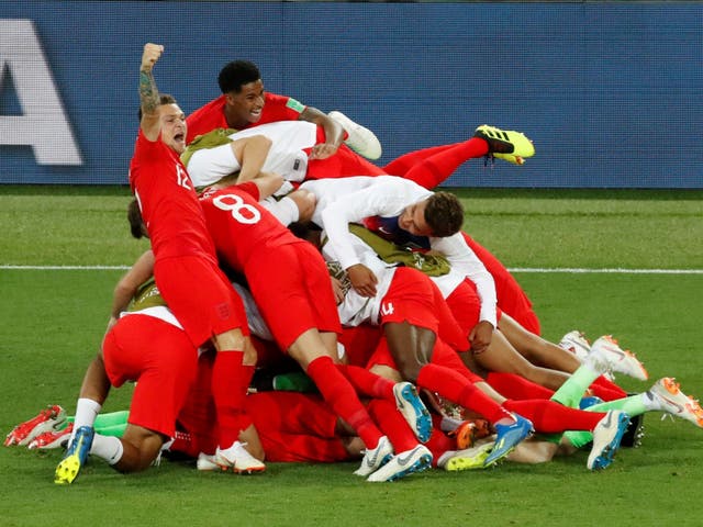 England players celebrate winning the penalty shootout