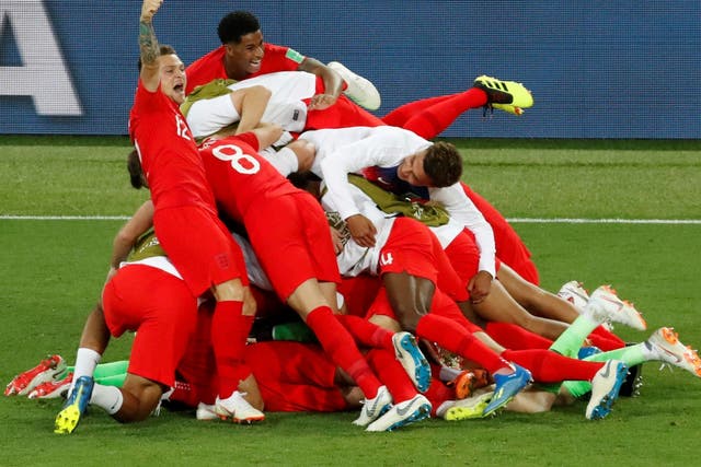 England players celebrate winning the penalty shootout