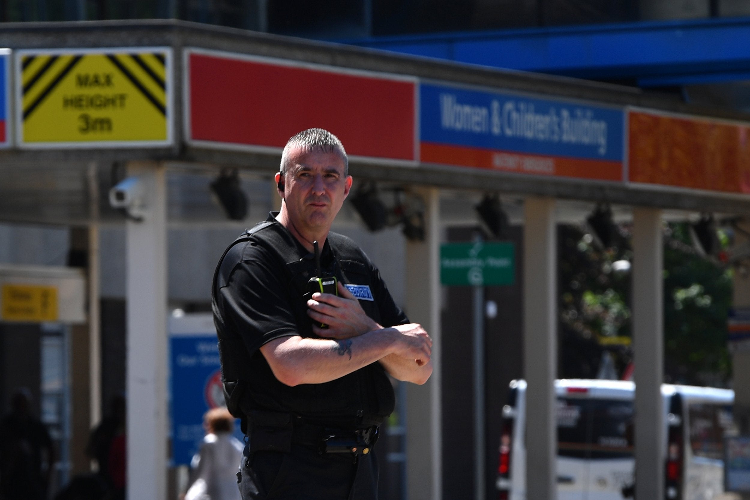 Security officers patrol outside the Countess of Chester Hospital