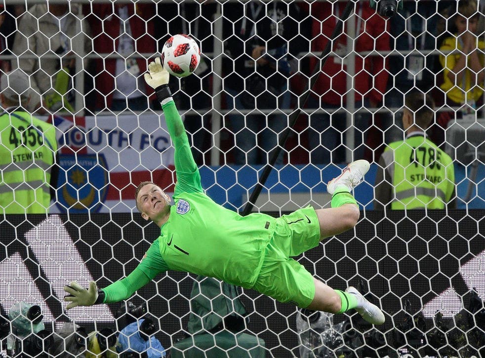 England's goalkeeper Jordan Pickford stops Colombia's forward Carlos Bacca's shot during the penalty shootout at the end of the Russia 2018 World Cup round of 16 football match between Colombia and England at the Spartak Stadium in Moscow on July 3, 2018