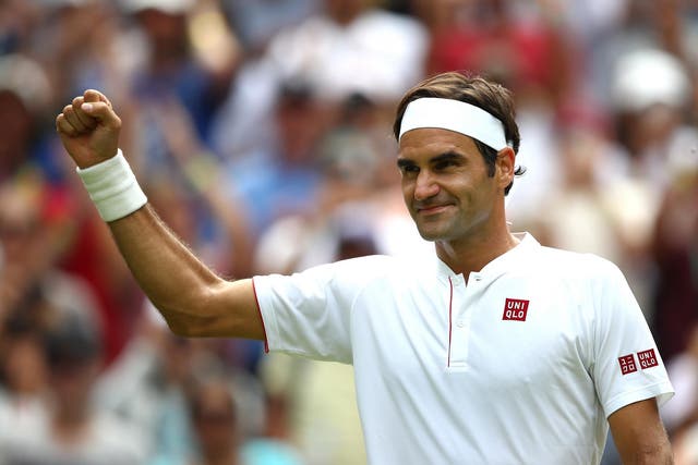 Roger Federer waves to the crowds after wrapping up victory in 90 minutes