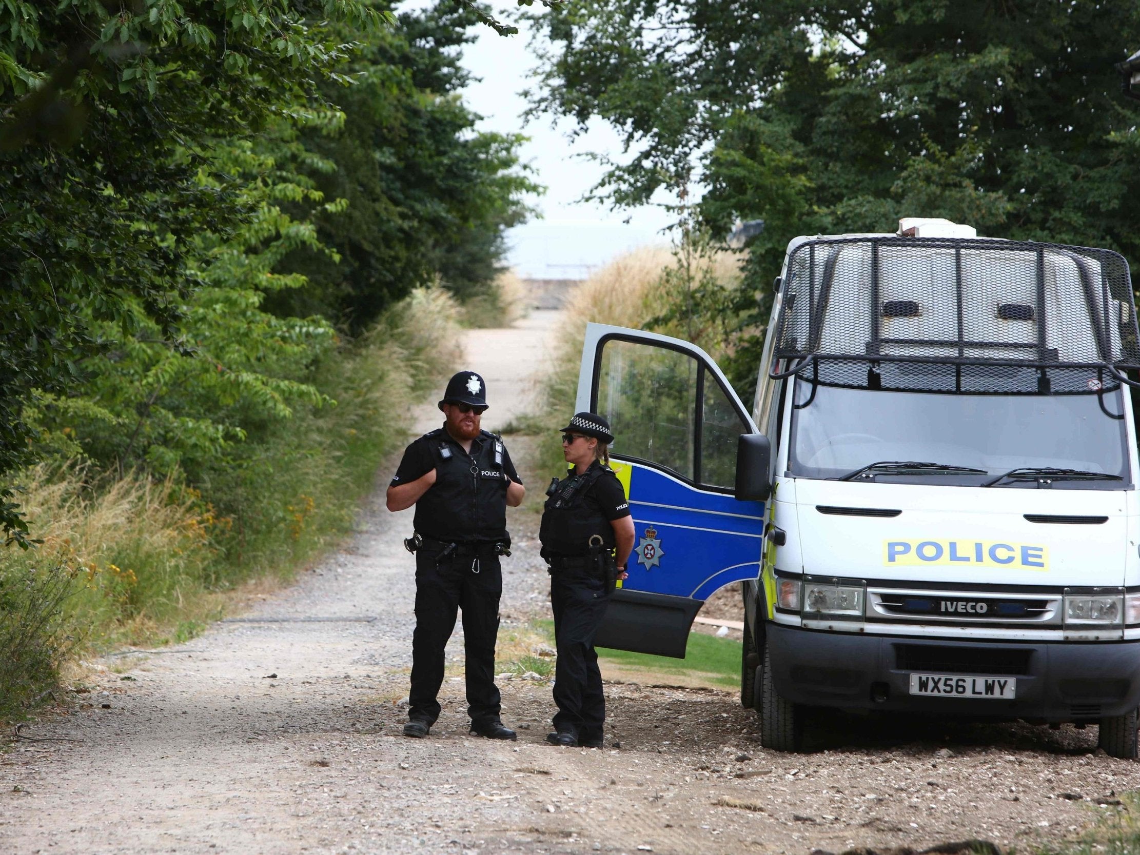 Police officers on duty outside Amesbury Baptist Centre in Amesbury, nine miles north of Salisbury