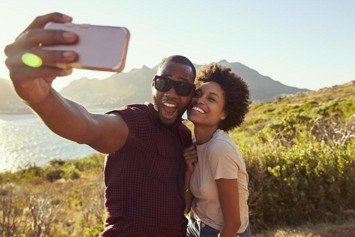 Showing off about your holidays online could leave you open to being burgled (Getty)