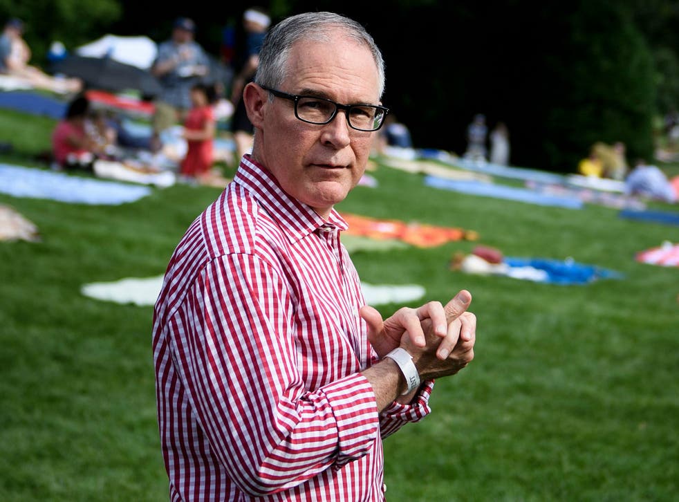 Recently-resigned Environmental Protection Agency Administrator Scott Pruitt walks during a picnic for military families at the White House 4 July 2018.
