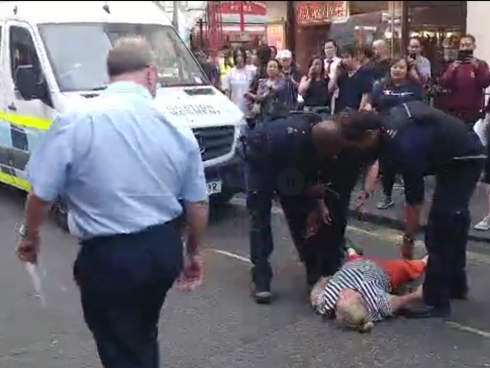 Immigration Officers Carrying Out Raid In Chinatown Clash With