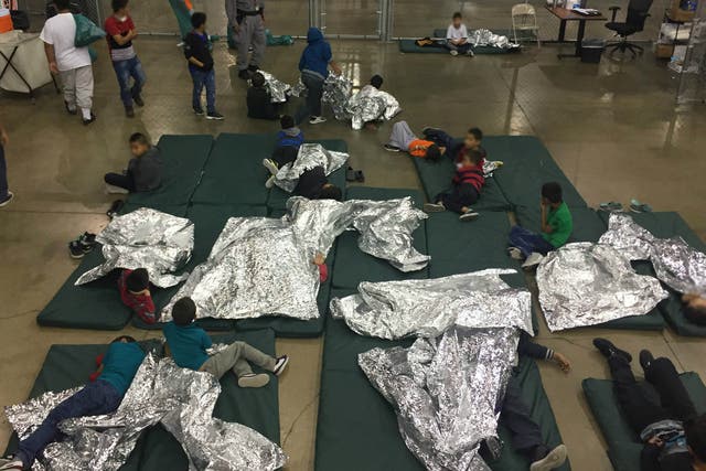 A view of inside US Customs and Border Protection (CBP) detention facility shows children at Rio Grande Valley Centralized Processing Center in Rio Grande City, Texas, on 7 June 2018