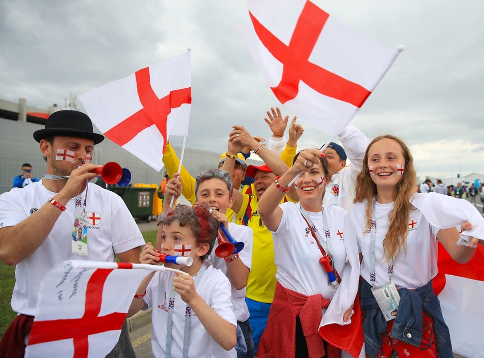 England fans wave the flag of St George at the World Cup 2018