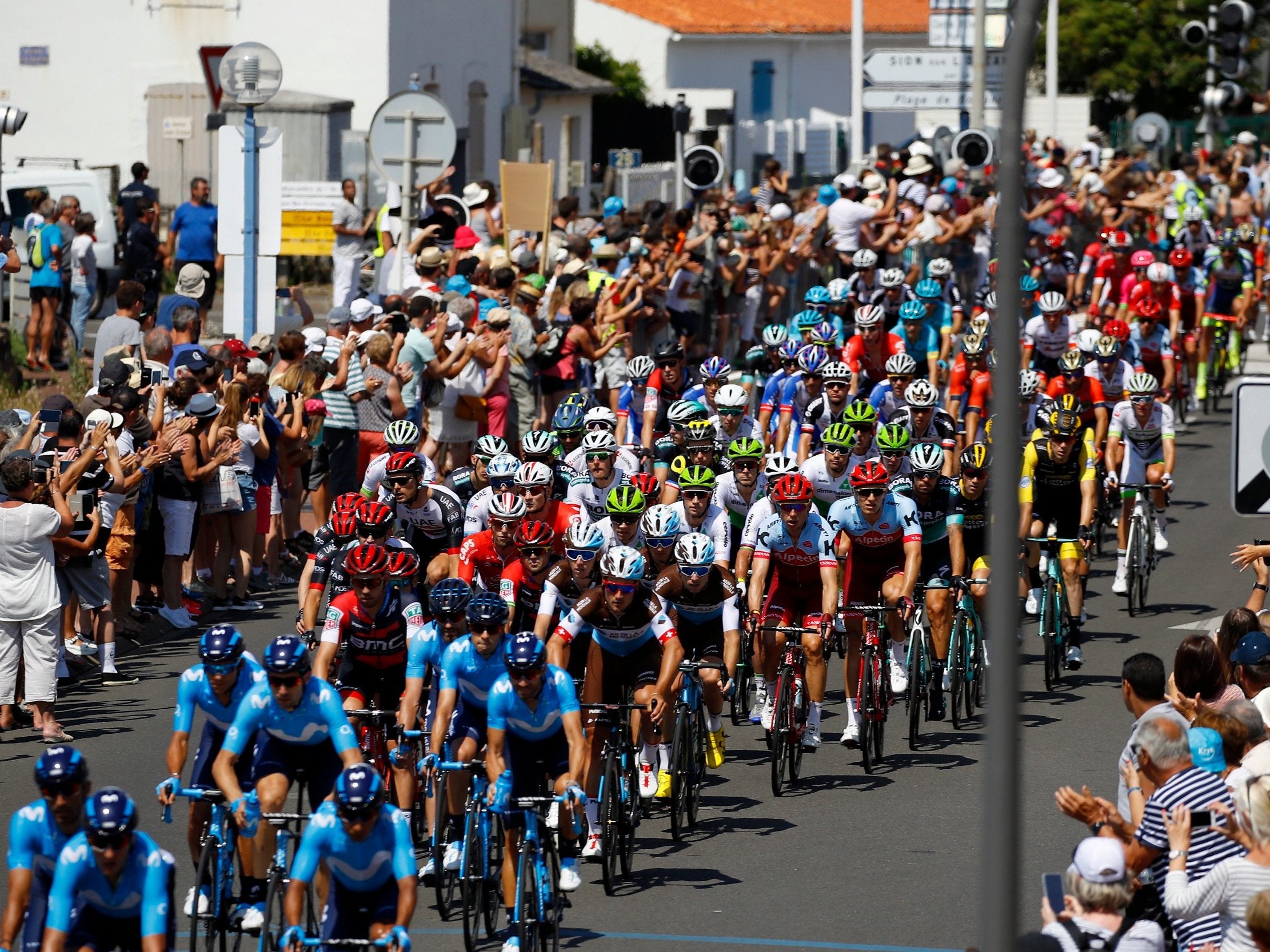 The pack of riders in action during the 1st stage of the 105th edition of the Tour de France