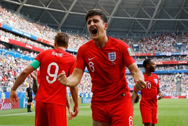 England's Harry Maguire celebrates scoring their first goal