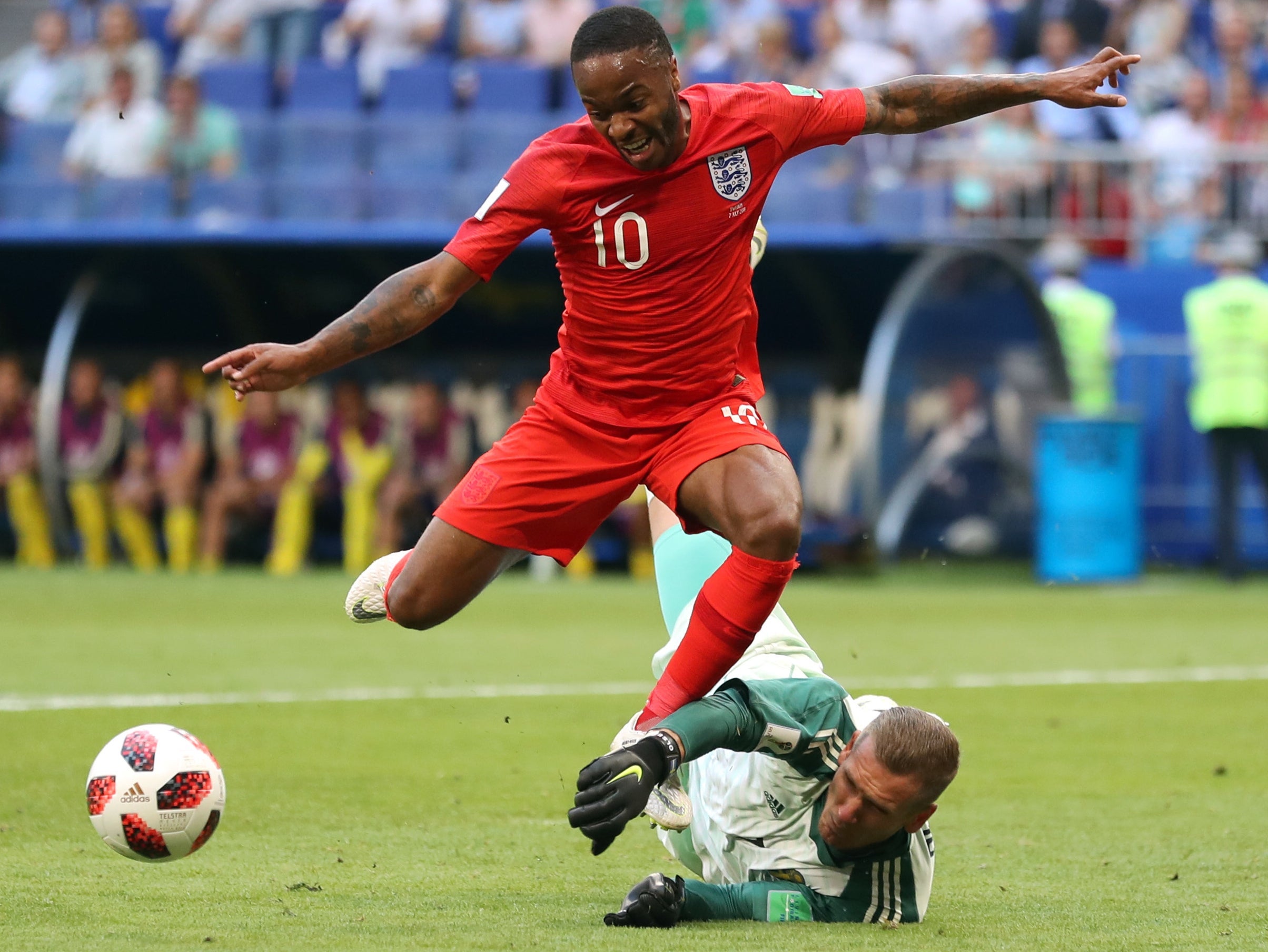 Raheem Sterling rounded Robin Olsen but couldn't finish