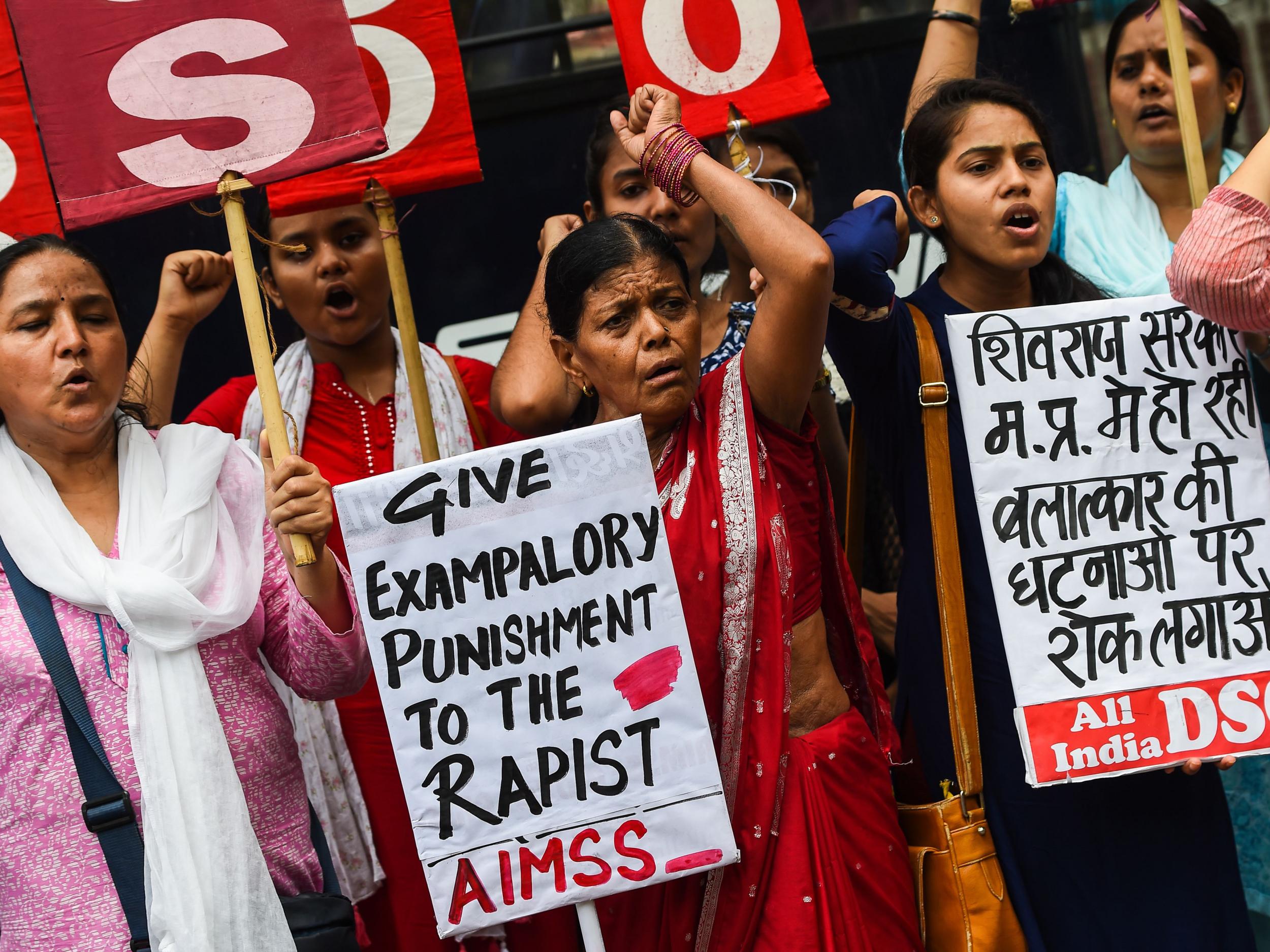 Indian women protest against the rape of an eight year old in in New Delhi