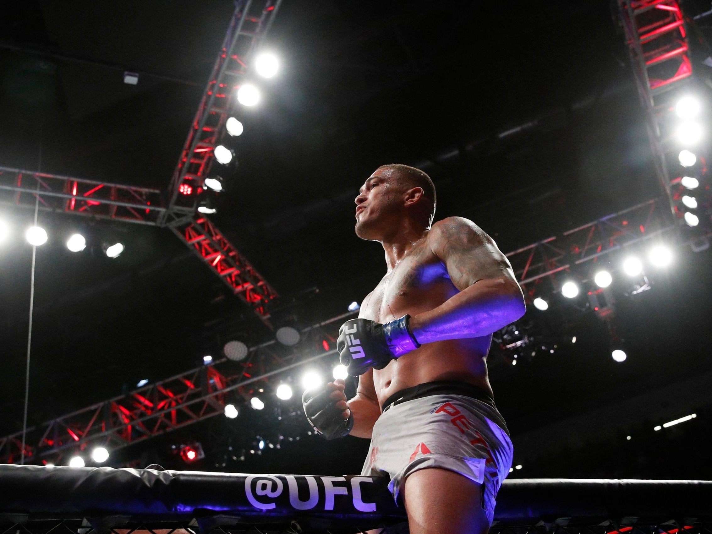 Anthony Pettis celebrates after defeating Michael Chiesa at UFC 226