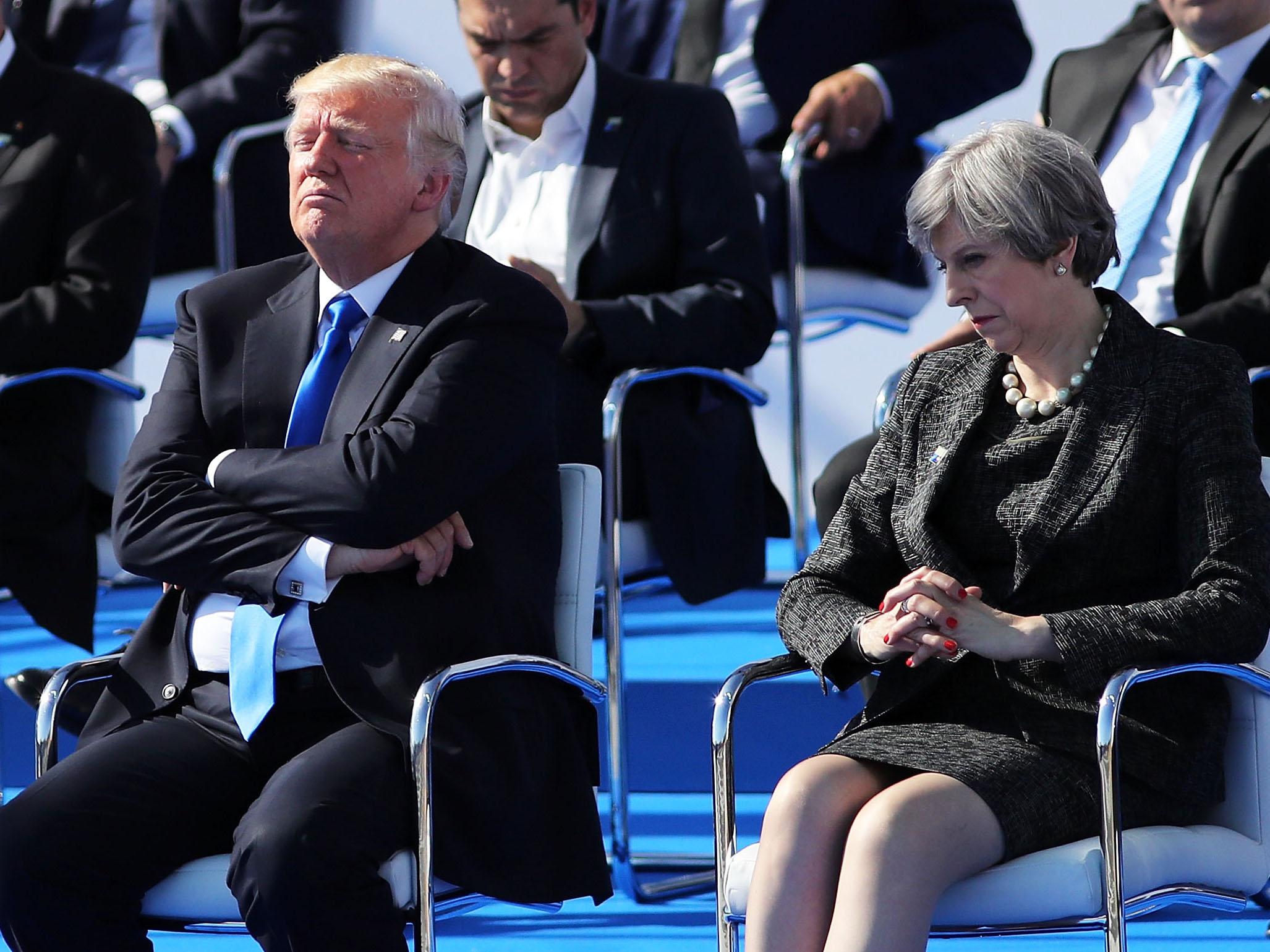 Climate scientists have urged Theresa May to challenge the US president on his climate ‘inaction’