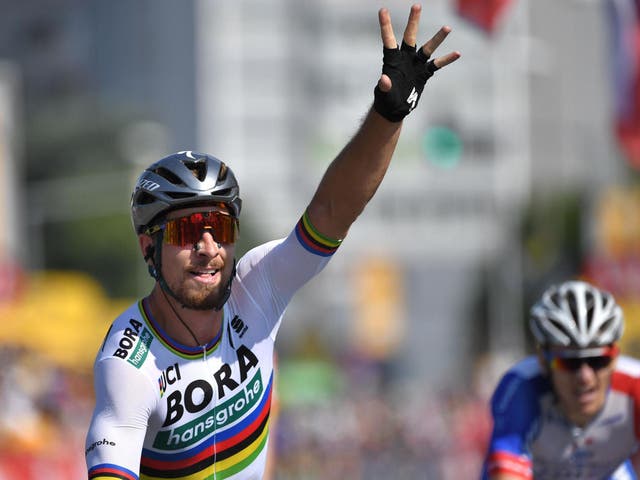Peter Sagan celebrates after crossing the line in first place