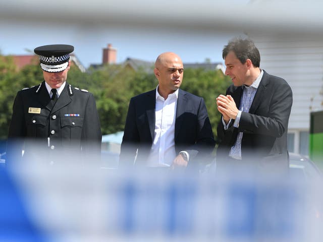 Home secretary Sajid Javid meets police officers at Muggleton Road in Amesbury, Wiltshire, where counterterrorism officers are investigating the exposure of a couple to novichok
