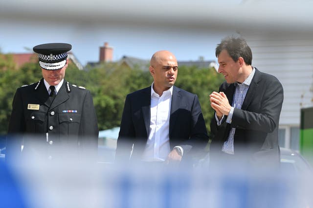 Home secretary Sajid Javid meets police officers at Muggleton Road in Amesbury, Wiltshire, where counterterrorism officers are investigating the exposure of a couple to novichok