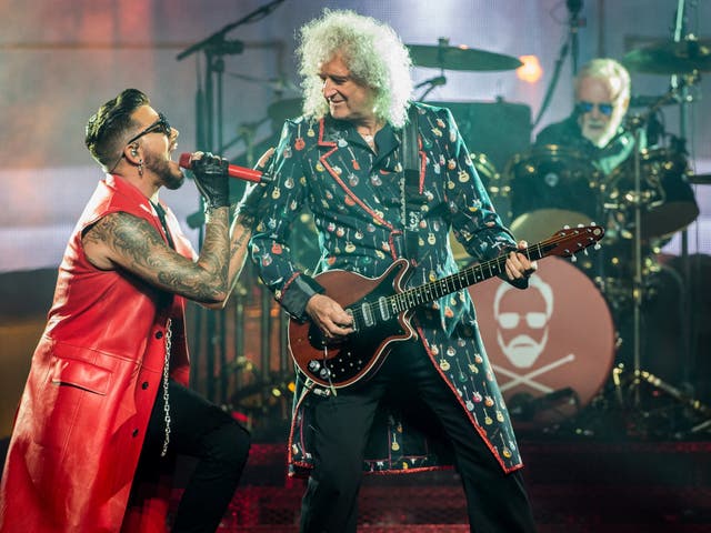 Adam Lambert performs with Brian May and Roger Taylor at The O2 Arena